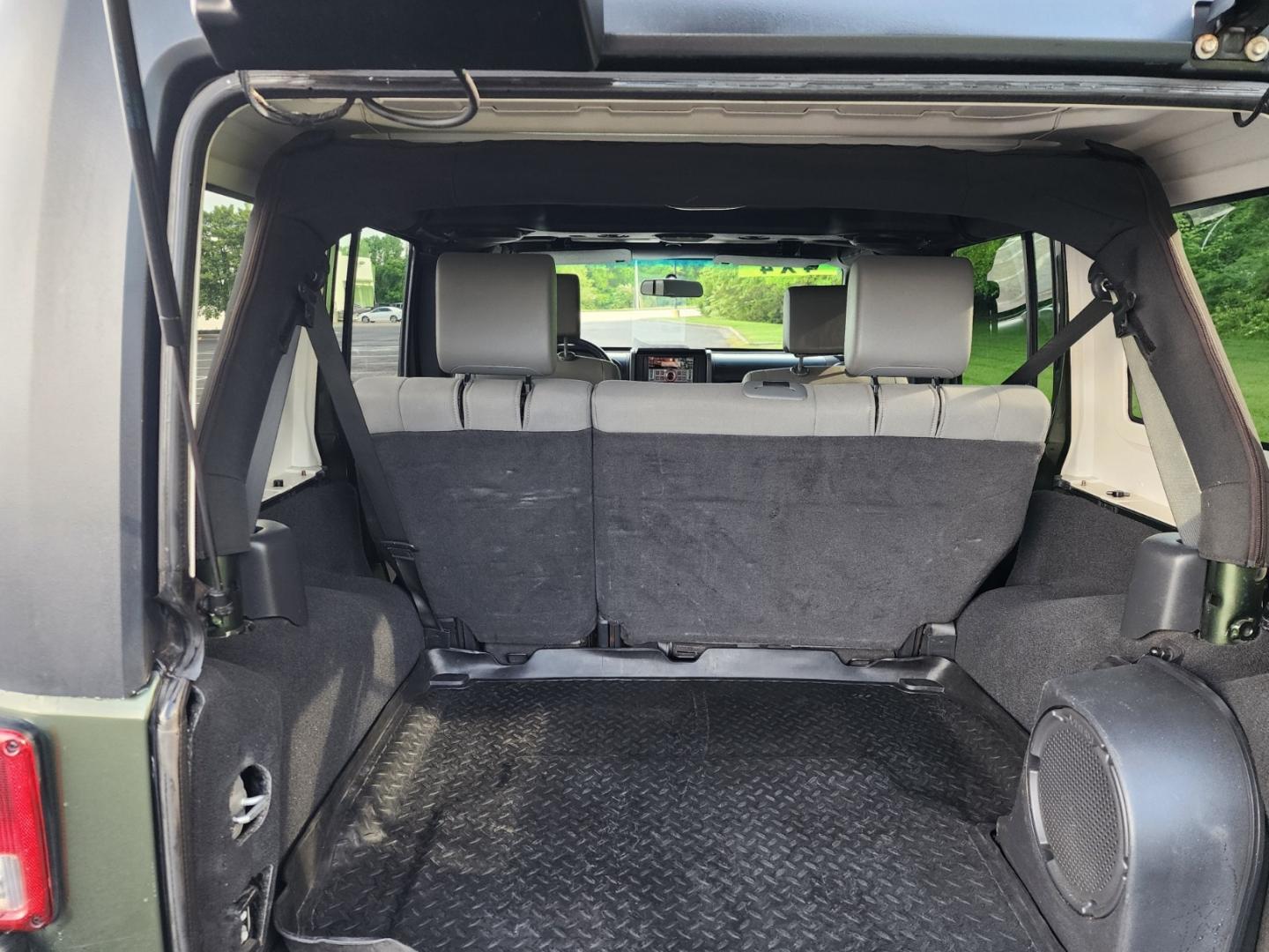 2008 Green /Black Jeep Wrangler Unlimited Rubicon (1J4GA69158L) with an 3.8L V6 OHV 12V engine, Automatic transmission, located at 1221 Madison St., Shelbyville, TN, 37160, (931) 680-9439, 0.000000, 0.000000 - Photo#2